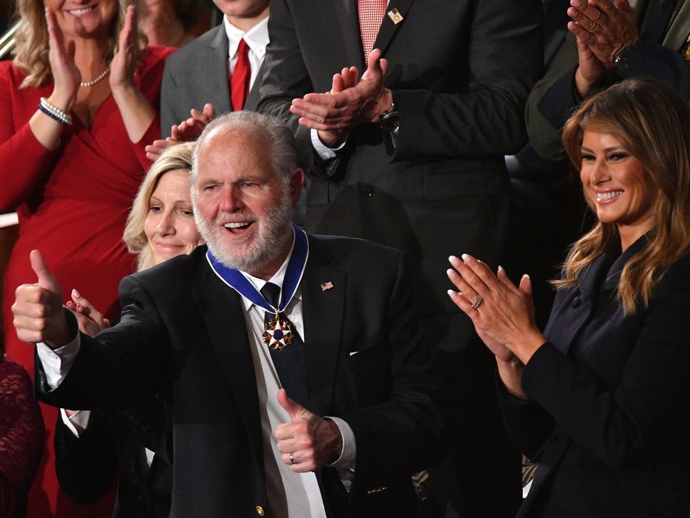 Radio personality Rush Limbaugh gives a thumbs-up after being awarded the Medal of Freedom during President Trump's 2020 State of the Union address.