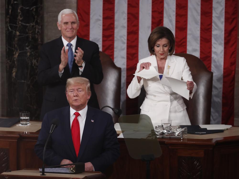 House Speaker Nancy Pelosi rips up a copy of President Trump's State of the Union address on Feb. 4, 2020.<br>