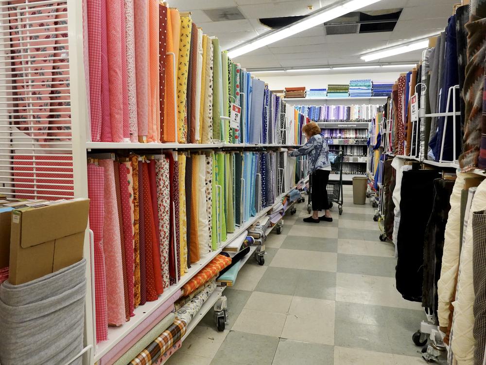 A customer shops in a Joann store in Miami on Feb. 13. The retailer announced last month that it is going out of business and closing its roughly 800 stores across the U.S.