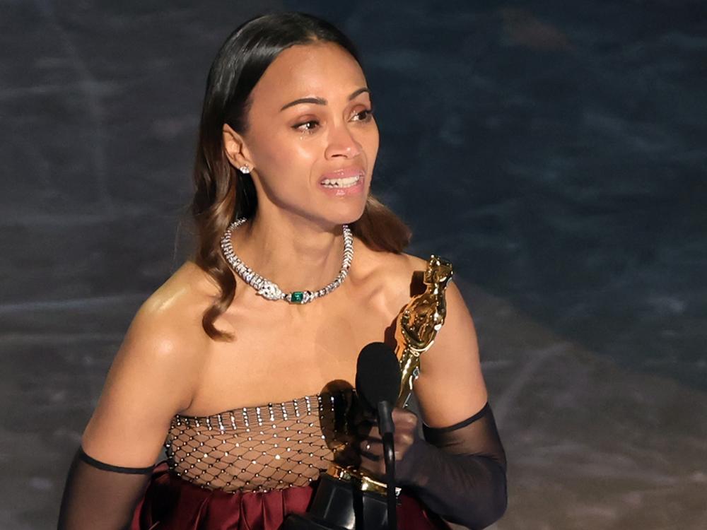 Zoe Saldaña accepts the best actress in a supporting role award for <em>Emilia Pérez</em> during the 97th Annual Oscars at Dolby Theatre in Hollywood, Calif.