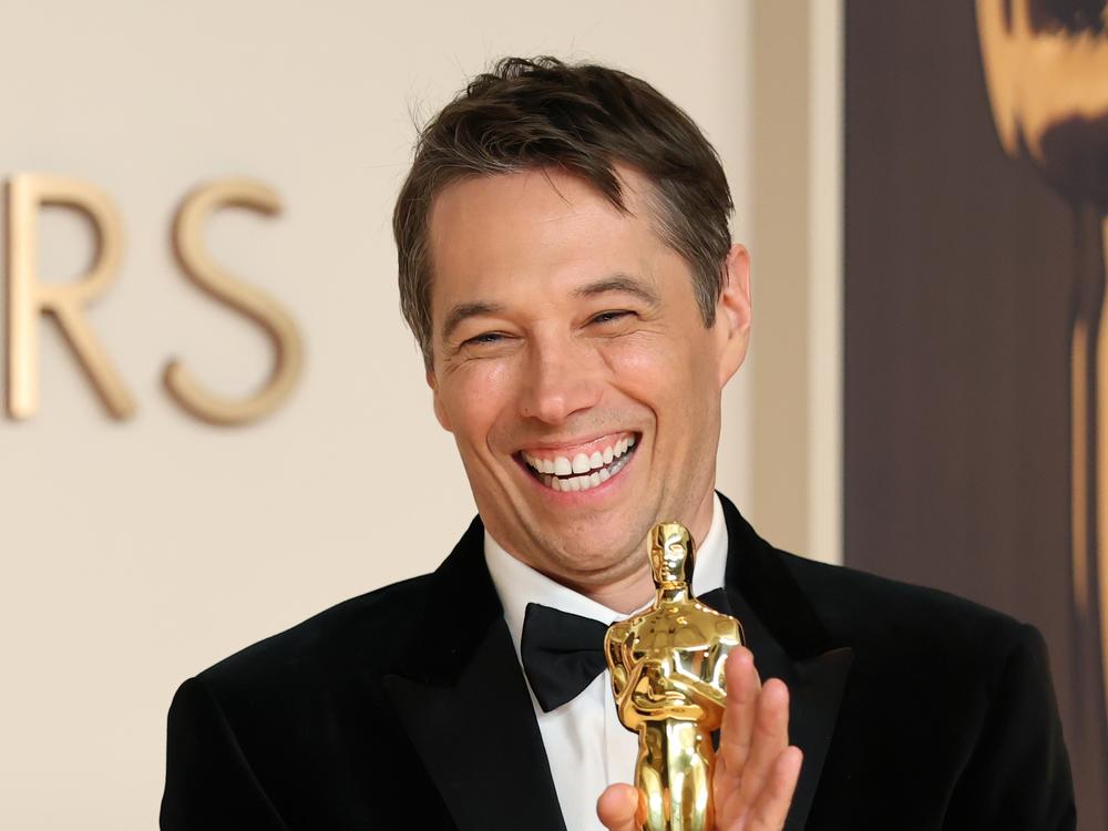 Sean Baker poses in the press room during the 97th Academy Awards.