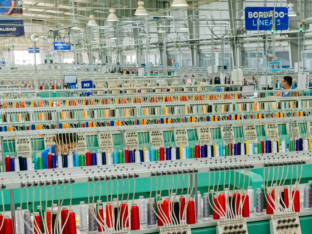 Randy Carr's company, World Emblem, does its most labor-intensive manufacturing in Aguascalientes, Mexico. Carr has paused investment while he tries to adjust to President Trump's new tariffs.