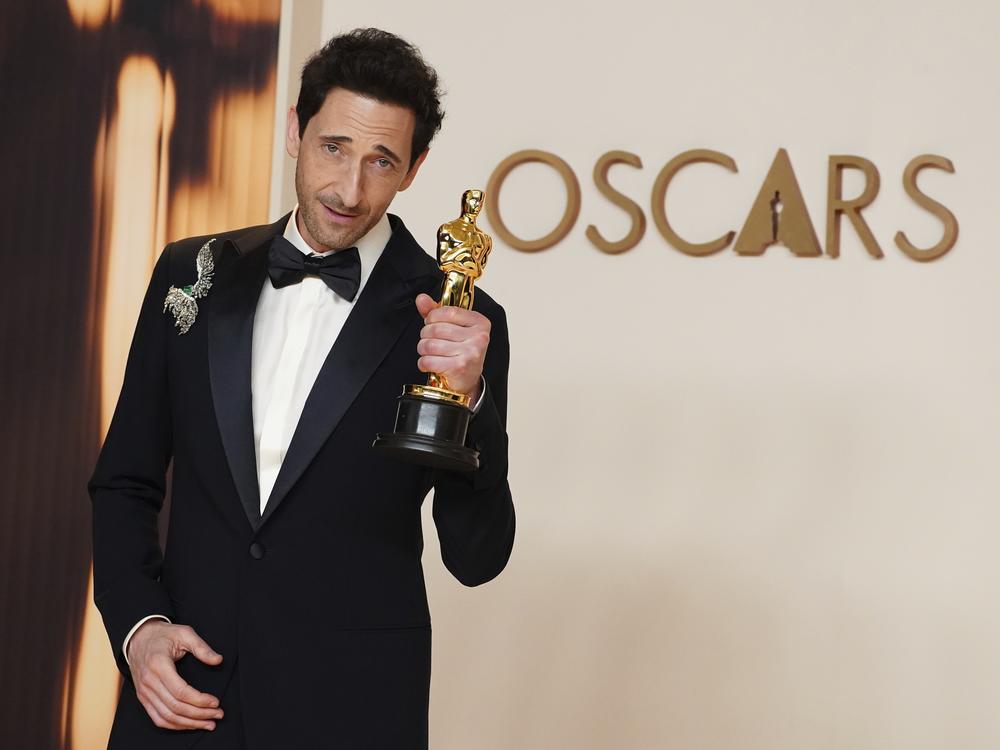 Adrien Brody, winner of the award for best performance by an actor in a leading role for <em>The Brutalist</em>, poses in the press room at the Oscars on Sunday, March 2 at the Dolby Theatre in Los Angeles.