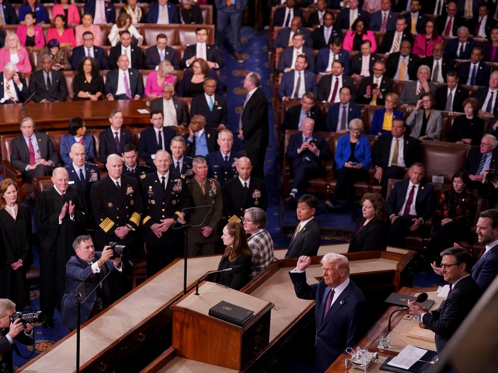 President Trump arrives for a joint session of Congress in the House Chamber of the Capitol.