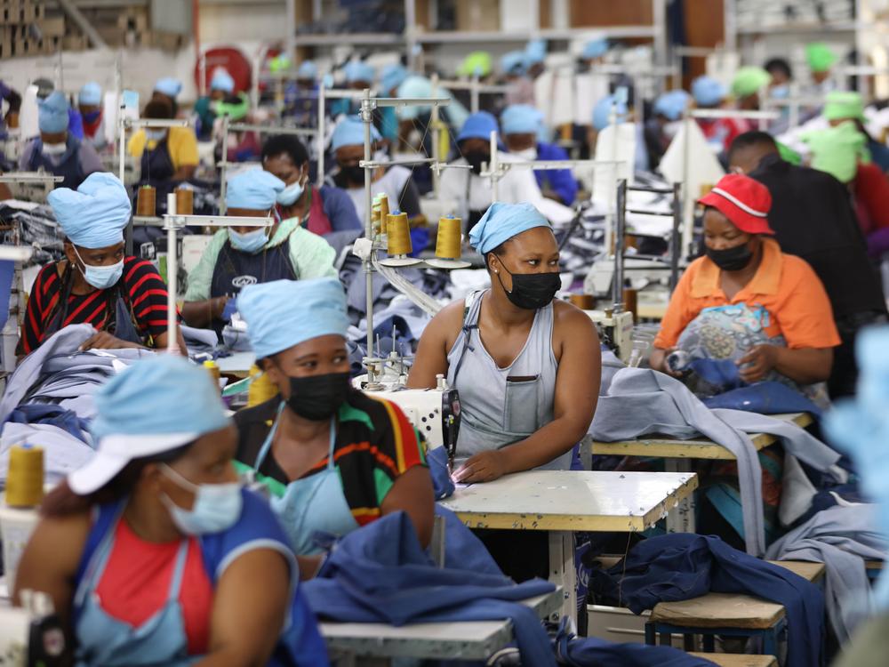 Matumelo Manosa (center) works in a garment factory in Maseru, Lesotho, on Feb. 24, 2022.