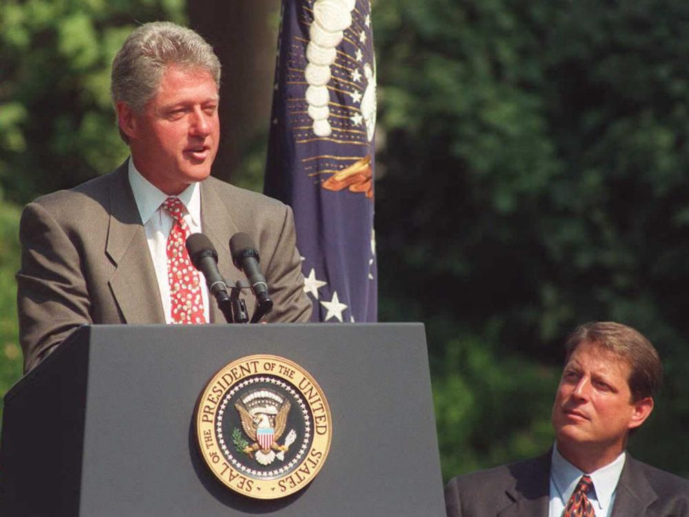 President Bill Clinton, seen here in 1995, discusses his Reinventing Government initiative, which cut more than 400,000 jobs over seven years. But an 