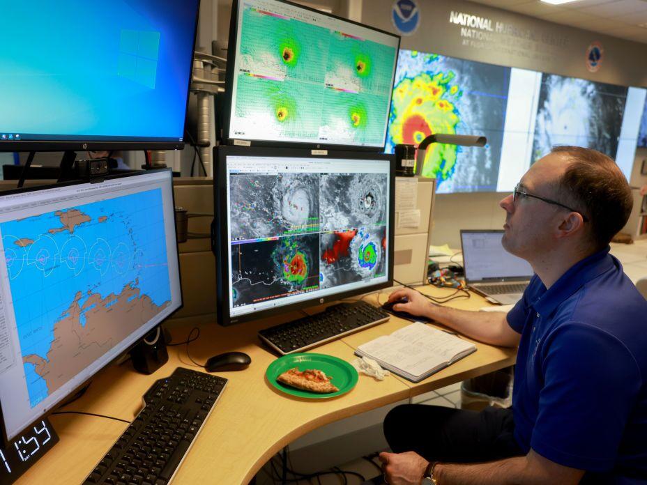 Brad Reinhart, senior hurricane specialist at the National Hurricane Center, tracks Hurricane Beryl, the first hurricane of the 2024 season, at the National Hurricane Center on July 1, 2024, in Miami.