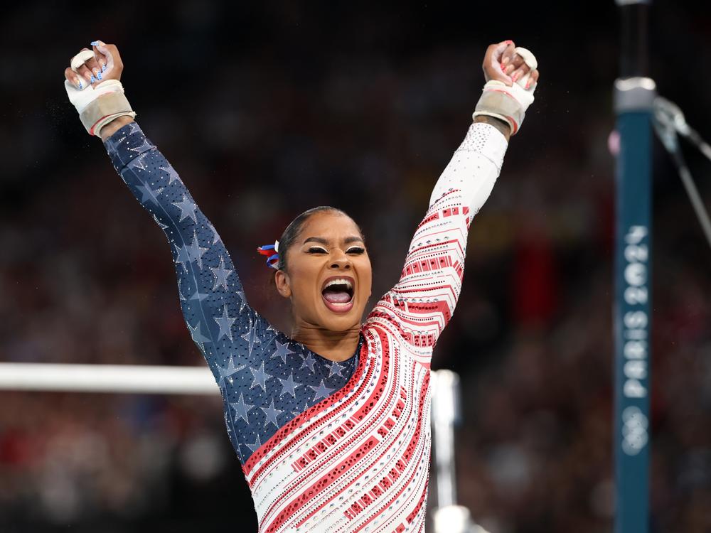 Jordan Chiles of Team USA reacts after finishing her routine on the uneven bars during the Olympic Games in Paris 2024.