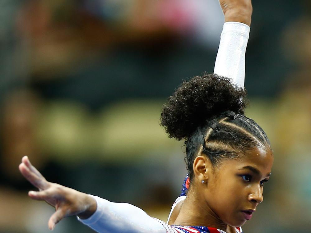 Jordan Chiles competes on the floor exercise in the junior women's finals during the 2014 P&G Gymnastics Championships at Consol Energy Center in Pittsburgh, Pennsylvania.