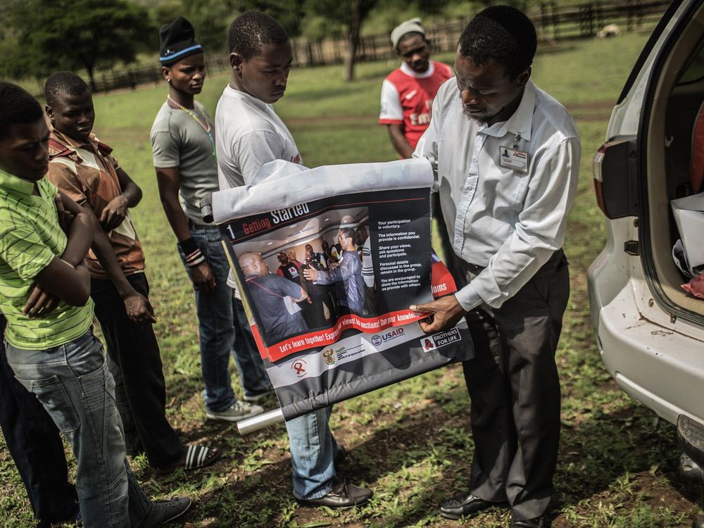 South African boys from a rural area are briefed by an health worker from Doctors Without Borders before undergoing medical circumcision as a form of HIV prevention. The U.S. has supported male circumcision programs in countries with high rates of HIV. In his address to Congress this week, President Donald Trump listed aid programs that he considers an 