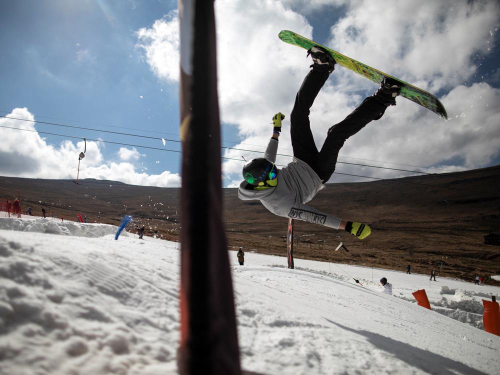 A snowboarder performs a back flip at Afriski in the Maluti Mountains in Lesotho.