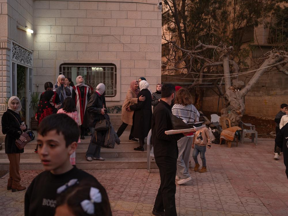 Family and friends celebrate the return of Ashraf Zughayer in East Jerusalem, on Jan. 25.
