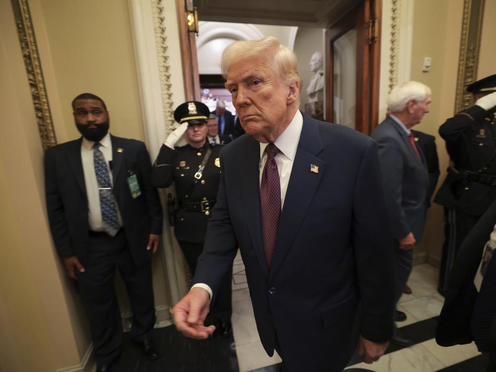 President Trump leaves the chamber after addressing a joint session of Congress on Tuesday. The administration is locked in a legal battle over the firing of the head of a federal watchdog agency.