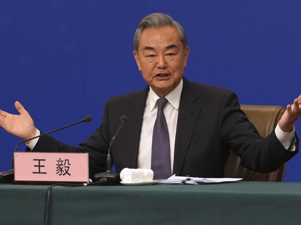 Chinese Foreign Minister Wang Yi speaks during a press conference on the sideline of the National People's Congress in Beijing on Friday.