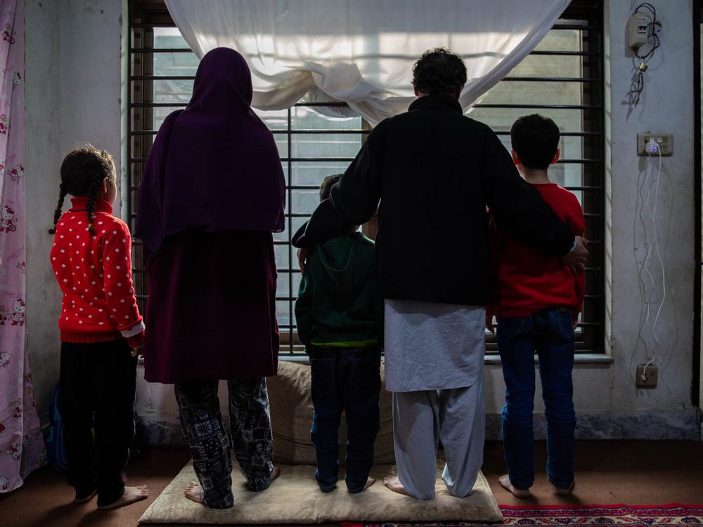 An Afghan family in their apartment in Islamabad, Pakistan, in January. Their U.S. resettlement case was denied the month before. They were deported and are now in hiding in Afghanistan.
