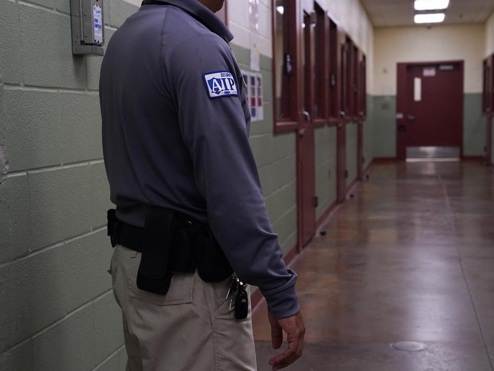 A security guard poses during a media tour of the Port Isabel Detention Center hosted by ICE in Los Fresnos, Texas in 2024. The Trump administration seeks to reopen family detention centers in the state.