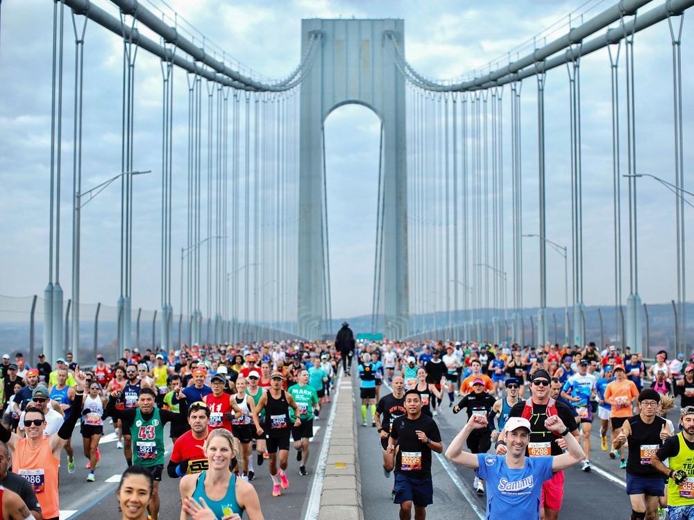 Runners cross the Verrazano Bridge before competing in the 52nd Edition of the New York City Marathon on November 5, 2023.