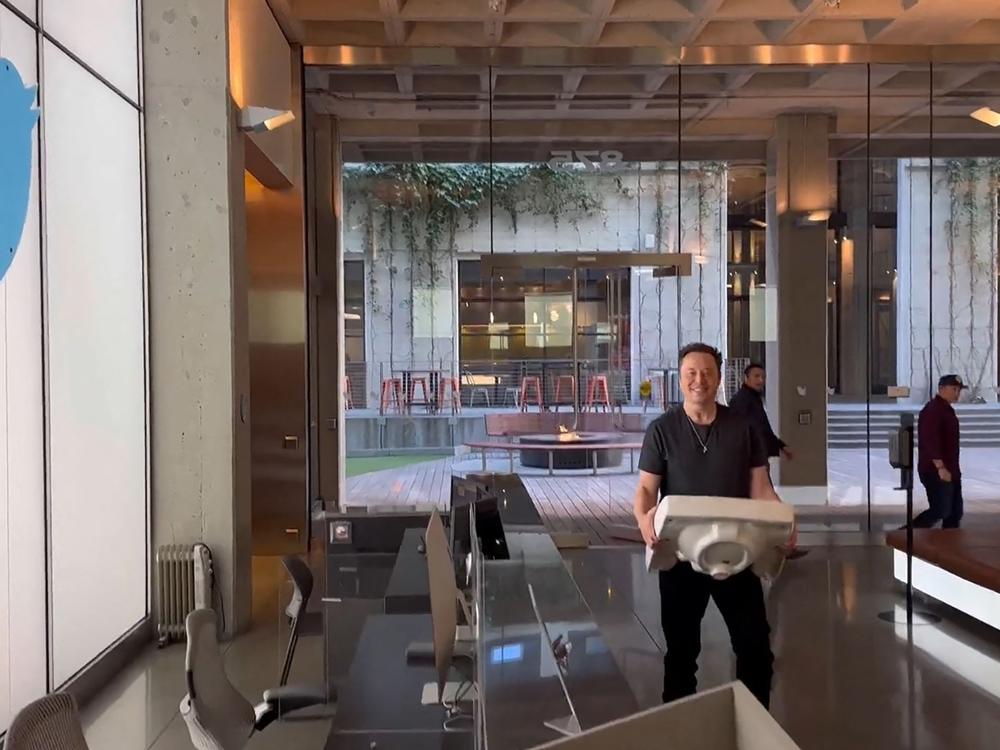 An image from a video posted by Musk on Oct. 26, 2022, shows him carrying a sink as he entered the Twitter headquarters in San Francisco shortly before he took control of the social media platform he later renamed X.