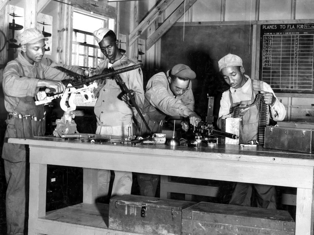 Armorers and other ground personnel undergo training at Chanute Field, Ill., during World War II.