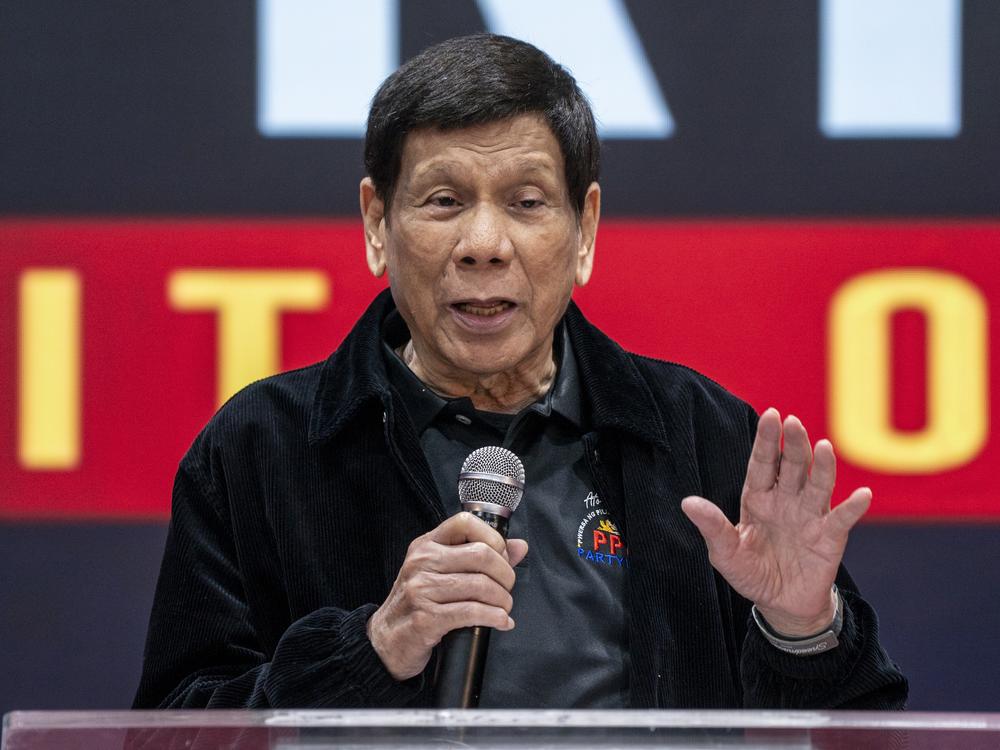 Former President of the Philippines Rodrigo Duterte speaks inside the Southorn Stadium during a thanksgiving gathering organized by Hong Kong-based Filipino workers for the former populist president in Hong Kong on March 9, 2025.
