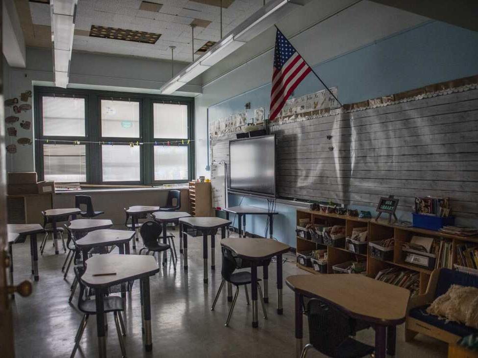 An empty elementary school classroom is seen on Tuesday, Aug. 17, 2021 in the Bronx borough of New York. Nationwide, students have been absent at record rates since schools reopened after COVID-forced closures. More than a quarter of students missed at least 10% of the 2021-22 school year.