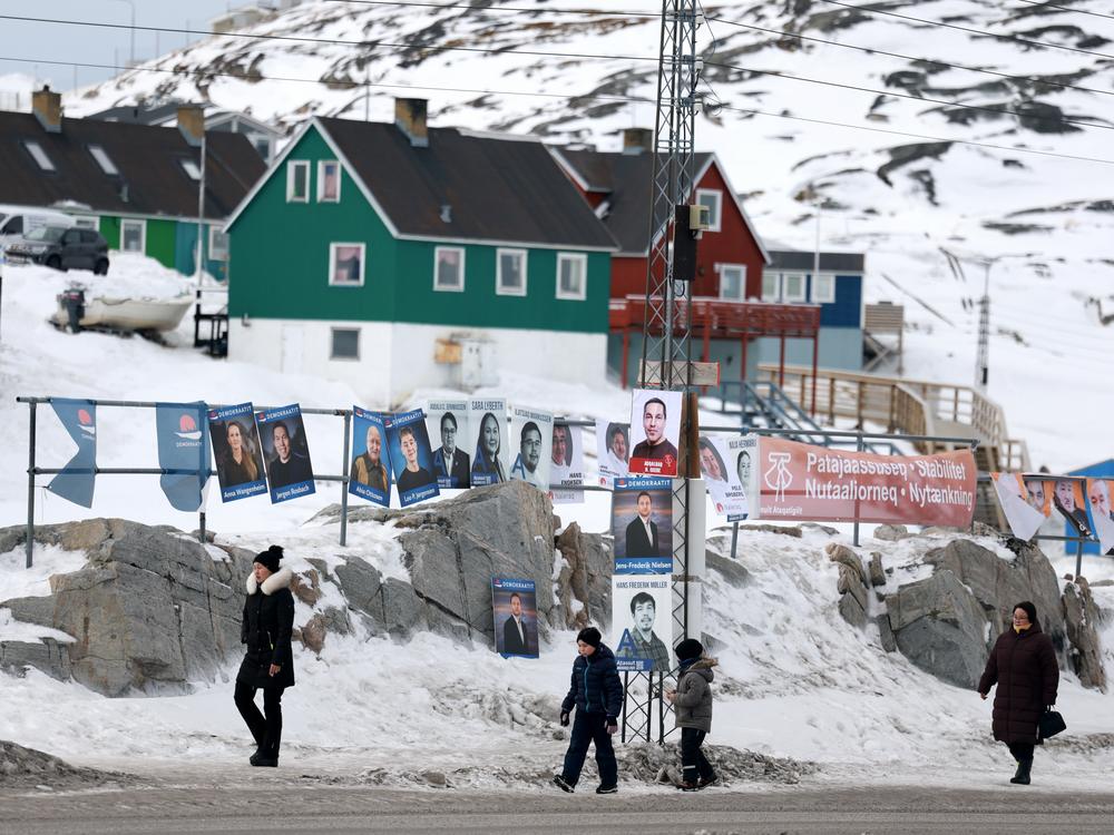 Campaign posters hang outside a polling station ahead of Greenland's March 11 election, in Ilulissat, Greenland. The island will elect the 31 members of its parliament, called the Inatsisartut. Greenland was due to hold elections by April 6, but Prime Minister Mute Egede called for an early vote amid the geopolitical tensions stoked by President  Trump's vow to take control of the autonomous Danish territory.