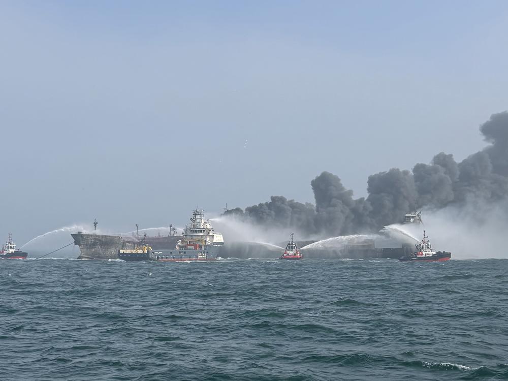 Fire and rescue services attend after a collision between oil tanker MV Stena Immaculate and the cargo vessel MV Solong off the coast of the Humber Estuary on Monday.