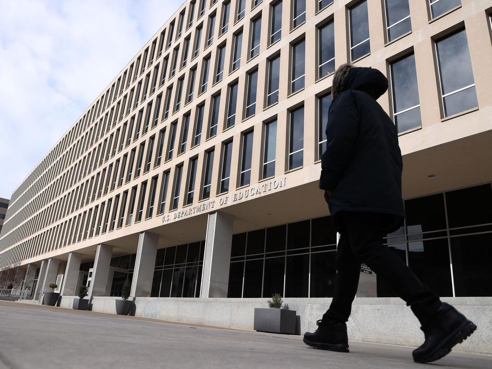 A man walks past the U.S. Department of Education building in Washington, D.C., on Feb. 7.