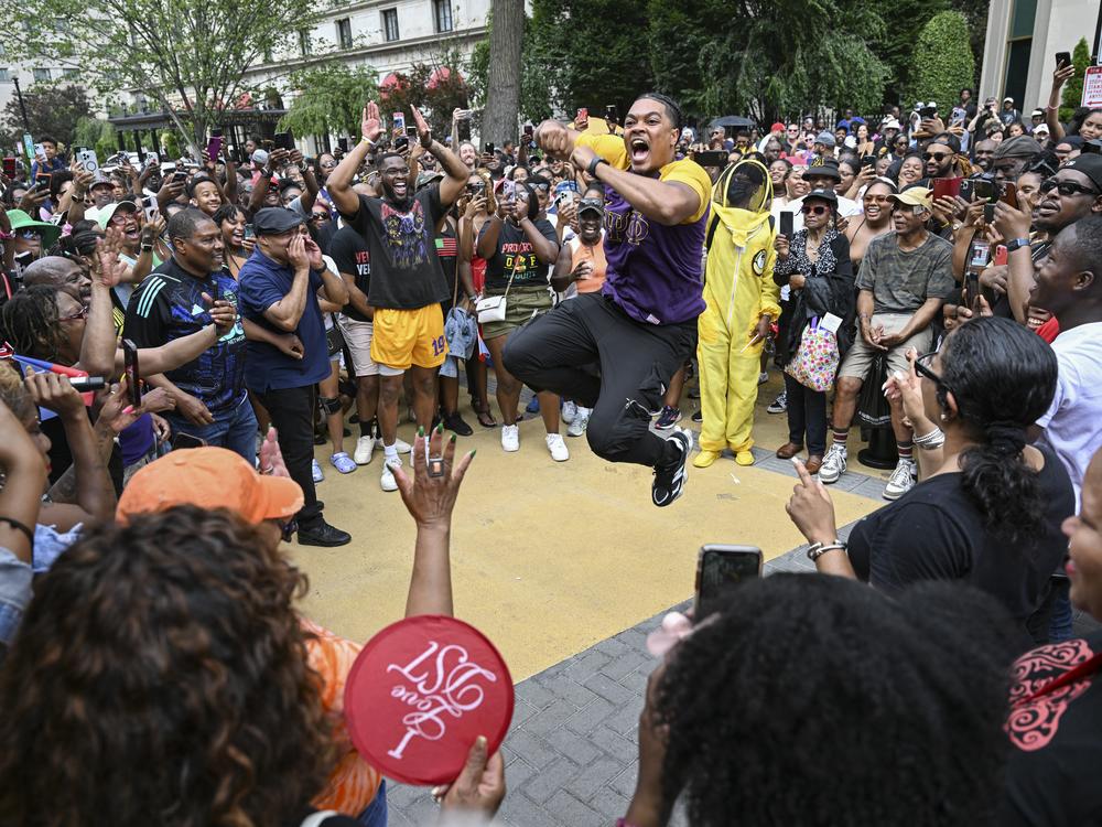 People gather to celebrate Juneteenth in Black Lives Matter Plaza near the White House on June 20, 2023.