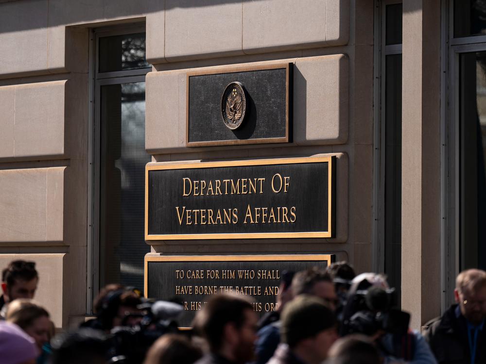 Protestors gathered outside the Department of Veterans Affairs headquarters in Washington, DC, US, on Feb. 13, 2025. The agency plans to cut 80,000 jobs.