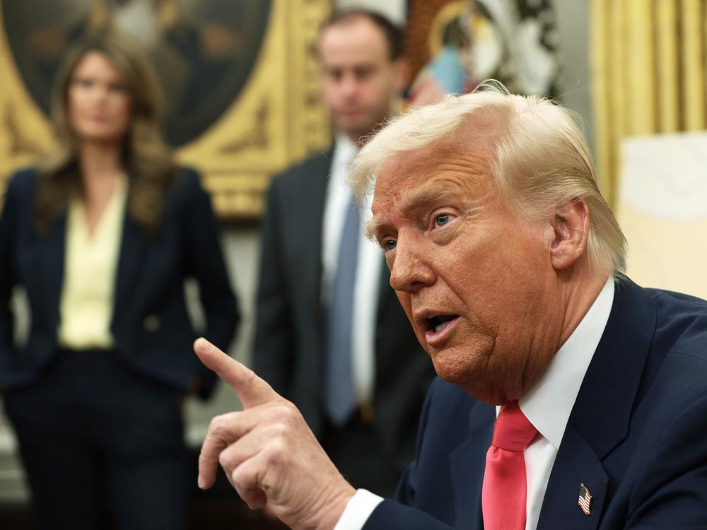 President Trump speaks after signing executive orders in the Oval Office of the White House on March 6, including one to lift 25% tariffs for all goods compliant under USMCA trade agreement.