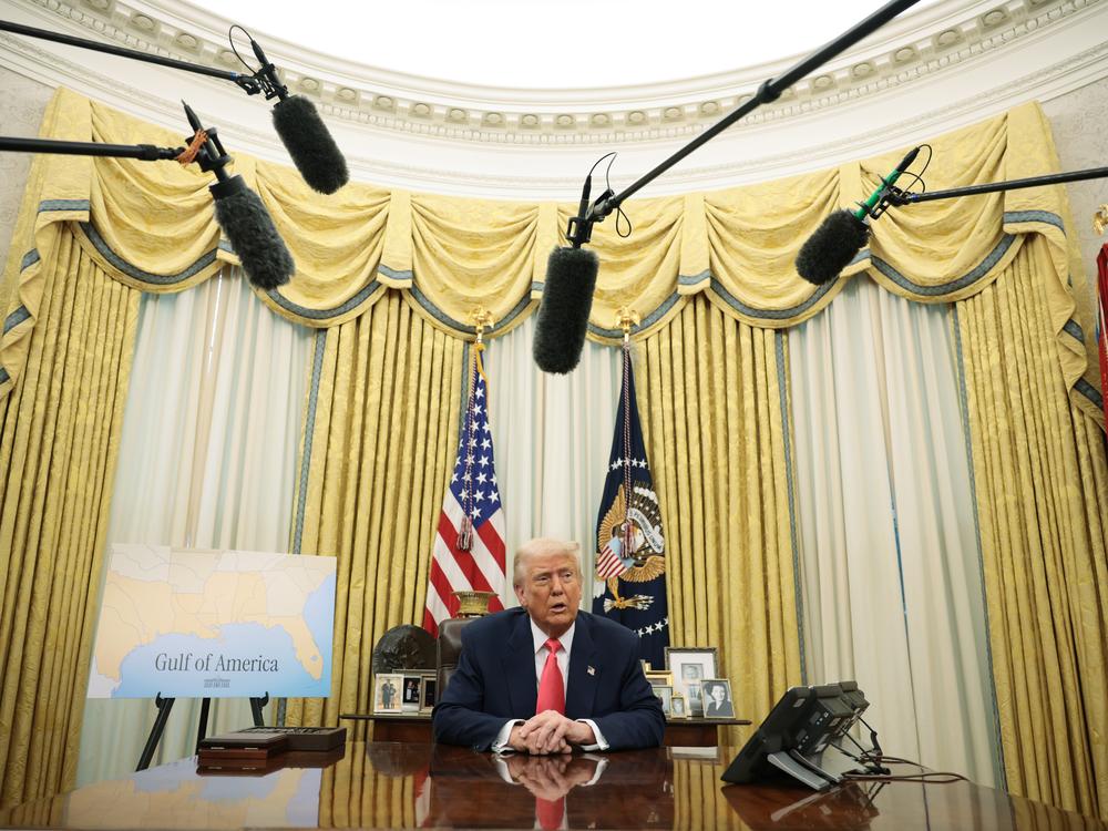 President Trump speaks as he signs executive orders in the Oval Office on March 6, including the order against the law firm Perkins Coie.