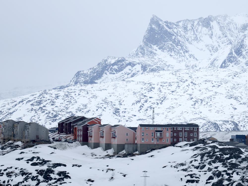 Homes built into the rugged landscape in Nuuk, Greenland, are seen on March 12. The self-ruling Danish territory has been thrust into the geopolitical spotlight as President Trump has vowed to acquire it.