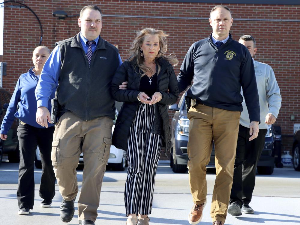 Kimberly Sullivan, who was taken into custody on Wednesday, faces charges including assault, kidnapping and unlawful restraint. She is accused of locking her stepson in his room for over 20 years.