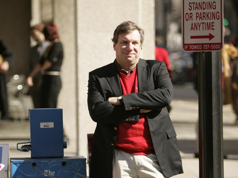 Sports writer and author John Feinstein poses in Washington, Feb. 28, 2006.