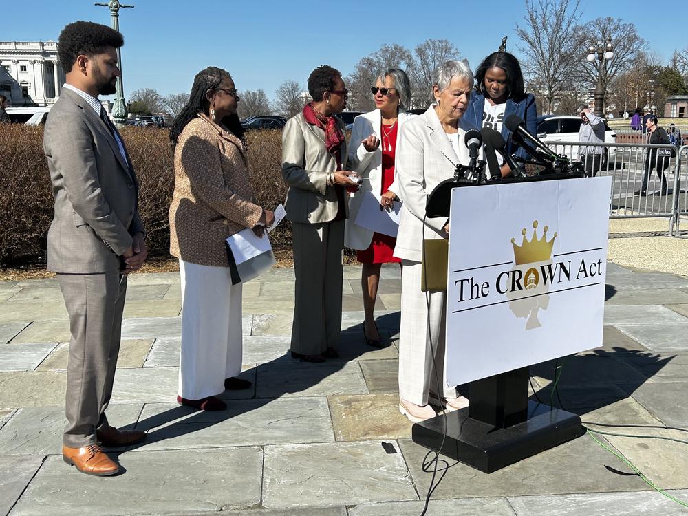 New Jersey Rep. Bonnie Watson Coleman, fellow Democratic lawmakers and Adjoa B. Asamoah, a co-founder of the CROWN coalition, speak at a press conference about the CROWN Act on Mar. 11 in front of the U.S. Capitol.