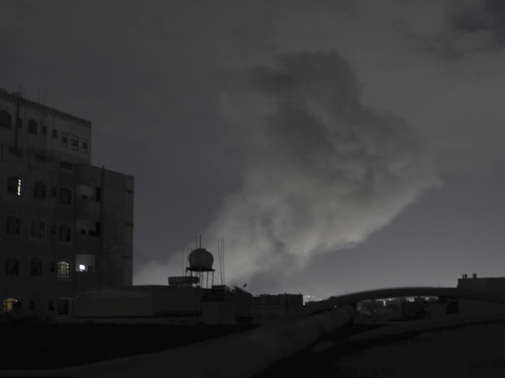 Smoke rises from a location reportedly struck by U.S. airstrikes in Sanaa, Yemen, on Saturday.