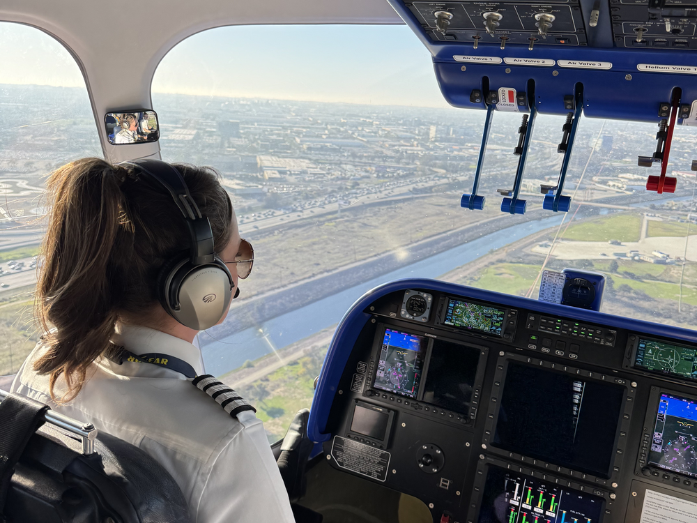 Goodyear Chief Pilot Taylor Deen steers the blimp above Los Angeles' southern shoreline.