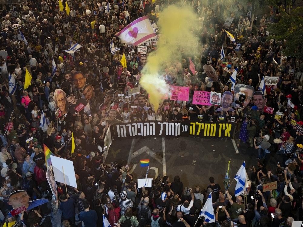 People take part in a protest Saturday in Tel Aviv, Israel, to demand the immediate release of hostages held by Hamas in the Gaza Strip.