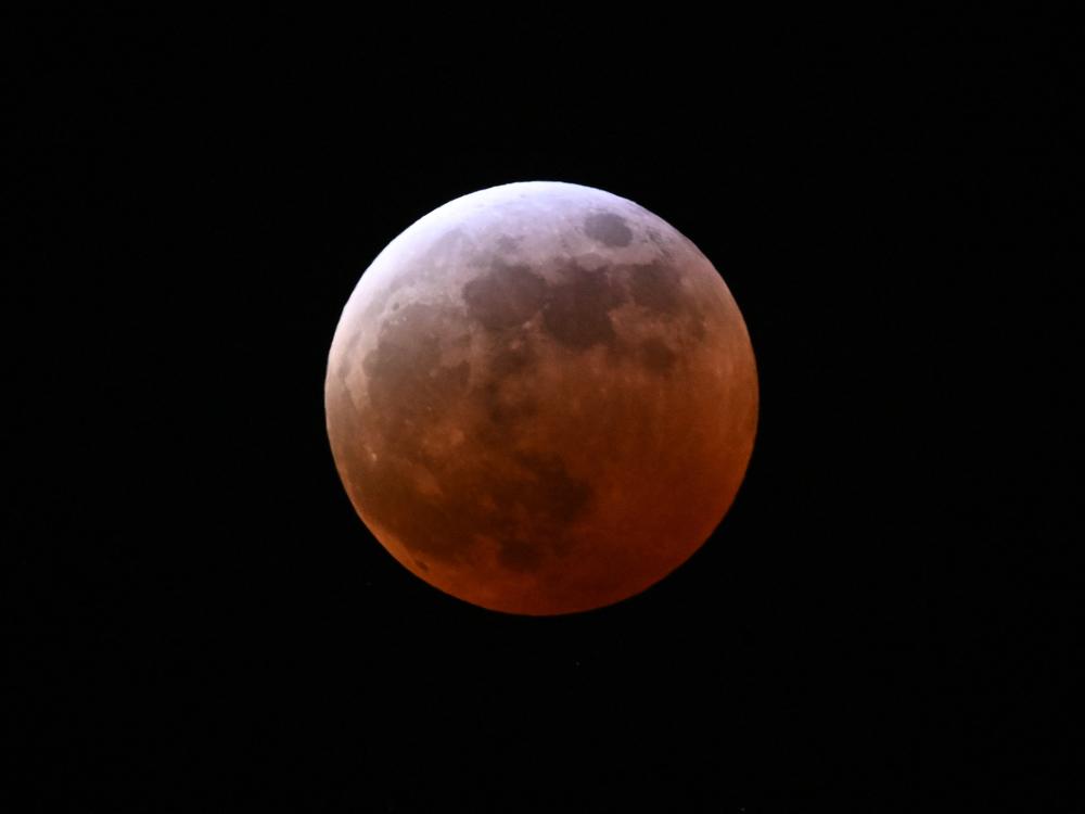 A full lunar eclipse is seen during the Blood Moon Lunar Eclipse in Palm Springs, California, on Thursday.
