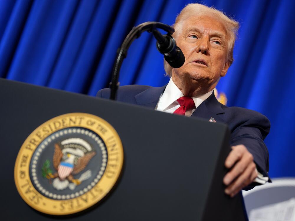 President Trump speaks at the Justice Department on Friday.