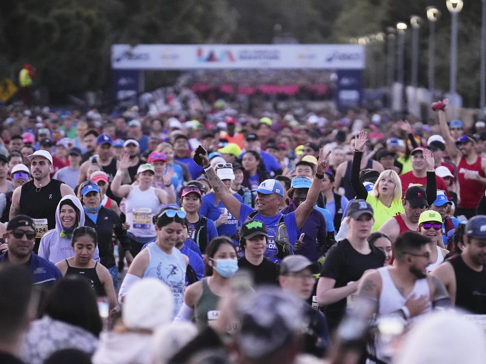 Participants prepare for the start of the Los Angeles Marathon Sunday, in Los Angeles.