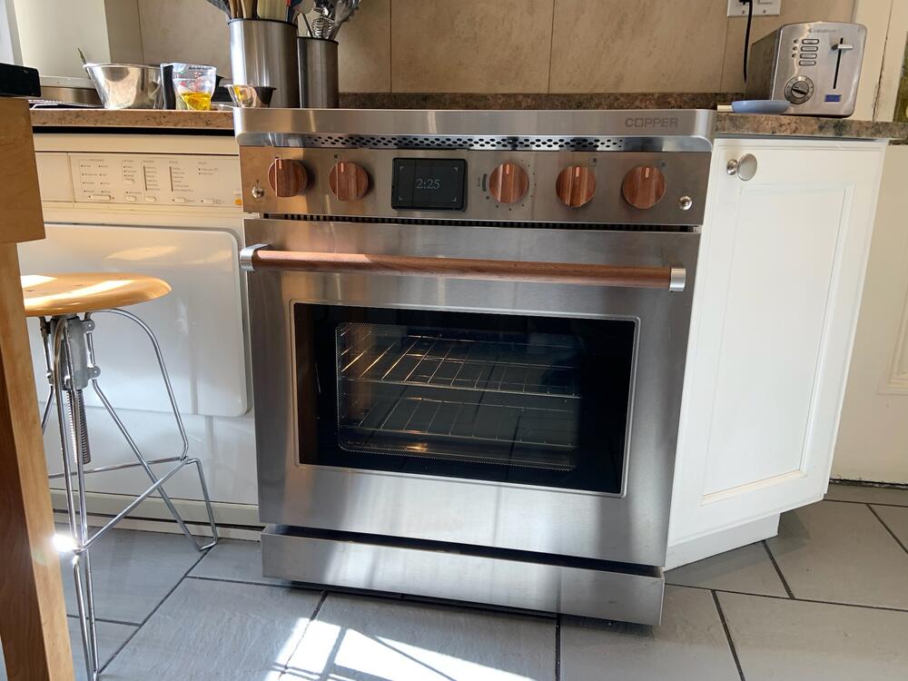 The Copper induction stove with a battery replaced Max Van Gilder's gas stove, without requiring expensive electrical upgrades.