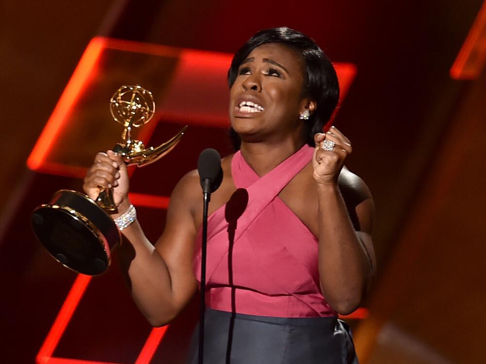 Actress Uzo Aduba accepts the award for outstanding supporting actress in a drama series for <em>Orange Is the New Black</em> during the 67th Annual Primetime Emmy Awards in September 2015.