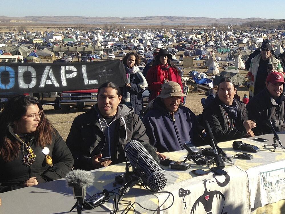 Organizers of protests against the construction of the Dakota Access oil pipeline spoke at a news conference near the building site in 2016. The company that built the pipeline, Energy Transfer, says the protests delayed its efforts and cost it millions in lost revenue, amongst other costs.