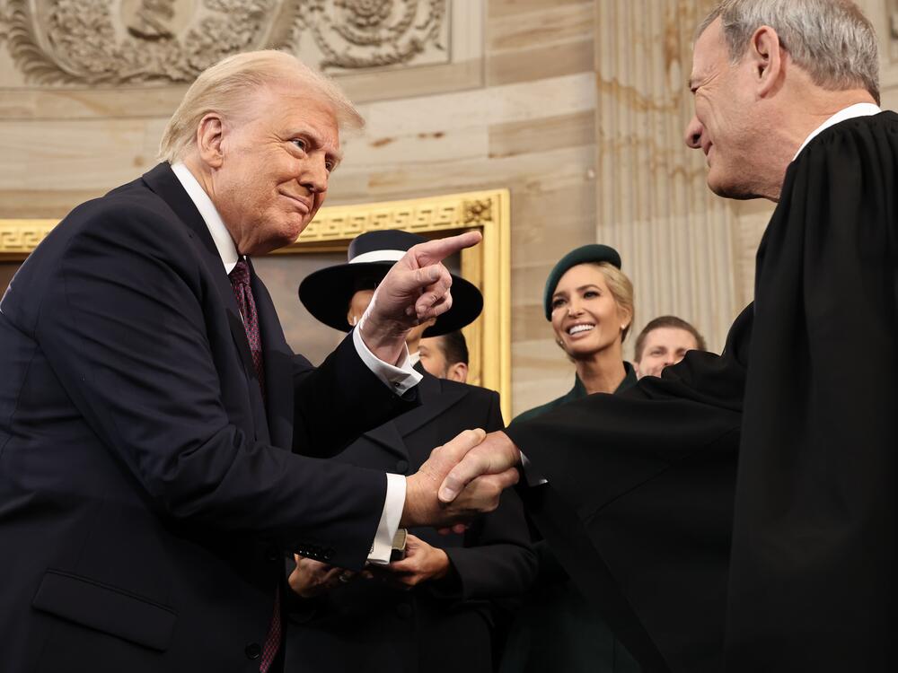 President Donald Trump gestures to U.S. Chief Justice John Roberts after his swearing-in ceremony in the Rotunda of the U.S. Capitol on Jan. 20.