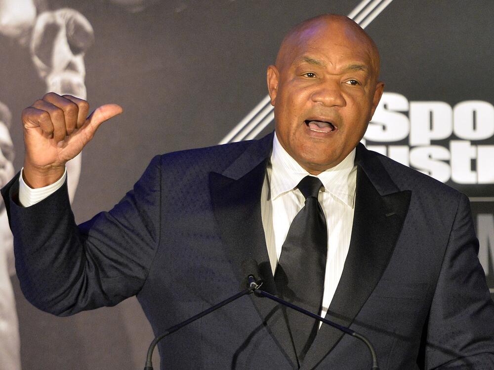 Former heavyweight boxing champion George Foreman tells a story to the audience at the Sports Illustrated Legacy Awards, Oct. 1, 2015, in Louisville, Ky.