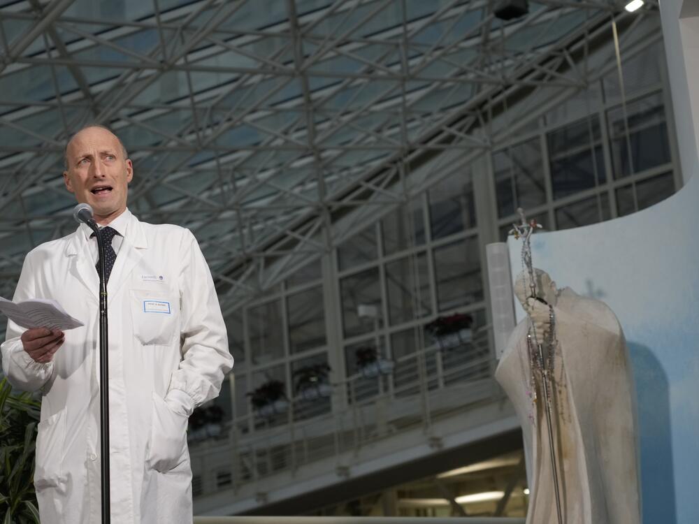 Surgeon Sergio Alfieri speaks to journalists on Saturday in the entrance hall of Rome's Agostino Gemelli Polyclinic, where Pope Francis has been receiving treatment for bilateral pneumonia.