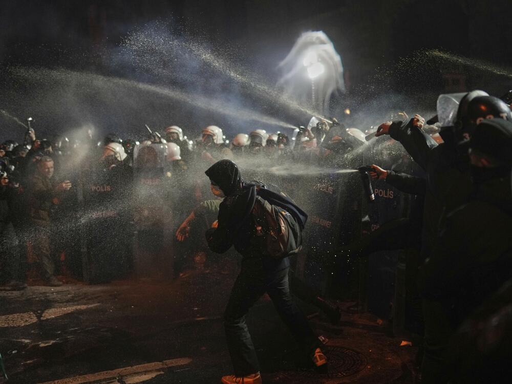 Riot police use pepper spray to clear protesters during a protest against the arrest of Istanbul's Mayor Ekrem Imamoglu, in Istanbul, Turkey, on Saturday.