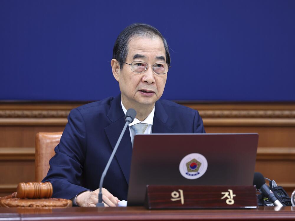 South Korea's Prime Minister Han Duck-soo, who became the country's acting leader after President Yoon Suk Yeol's impeachment, is shown speaking during a cabinet meeting at the government complex in Seoul, South Korea, on Dec. 24, 2024.